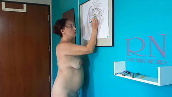 A naked art class: An Indian nudist paints a mandala to the tune of soothing music. Scene 1.